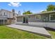 A spacious concrete patio in backyard, perfect for outdoor entertaining and dining at 2646 S Pagosa Way, Aurora, CO 80013