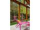 Backyard patio features a wooden pergola and colorful seating, perfect for relaxing or entertaining at 13313 Cherry Cir, Thornton, CO 80241