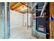 Unfinished basement features concrete floors and walls, and updated mechanical systems at 13313 Cherry Cir, Thornton, CO 80241