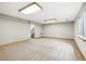 Spacious finished basement with carpet, recessed lighting, and window view at 13313 Cherry Cir, Thornton, CO 80241