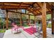 Outdoor patio area, perfect for entertaining, with a wooden pergola and stylish furnishings at 13313 Cherry Cir, Thornton, CO 80241
