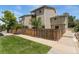 Well-maintained backyard featuring a lawn and a wooden privacy fence at 6011 Yarrow St # I, Arvada, CO 80004