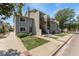 Attractive townhouse exterior with well-kept lawn and inviting entrance at 6011 Yarrow St # I, Arvada, CO 80004