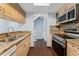 Stylish kitchen features granite counters, stainless appliances, and a functional layout for easy meal preparation at 6011 Yarrow St # I, Arvada, CO 80004