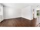 Open-concept room featuring wood-look floors and plenty of natural light, ideal for comfortable living at 6011 Yarrow St # I, Arvada, CO 80004