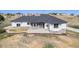 Stunning aerial view of the property featuring the well-maintained exterior and surrounding neighborhood at 10071 E 142Nd Ave, Brighton, CO 80602