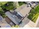 Overhead view of a home with a large lot, well-manicured lawn, patio, and solar panels at 794 W Elati Cir, Littleton, CO 80120