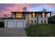 Charming two-story home with a two-car garage, balcony, and landscaped front yard at 794 W Elati Cir, Littleton, CO 80120