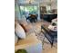 Open-concept living room with a dining area and kitchen featuring modern appliances, perfect for entertaining at 794 W Elati Cir, Littleton, CO 80120