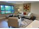 Comfortable living room filled with bright, natural light offers stylish decor and neutral tones for a cozy feel at 794 W Elati Cir, Littleton, CO 80120