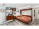 Bedroom area with a murphy bed, built-in shelving, and a modern design; perfect for flexible living at 1423 Dahlia St, Denver, CO 80220