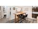 Dining area features seating for four, with seamless flow from kitchen and living areas at 1423 Dahlia St, Denver, CO 80220