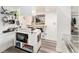 Stylish kitchen area with a vintage-style oven and cooktop, with seating at the breakfast bar at 1423 Dahlia St, Denver, CO 80220