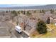 Aerial view of townhomes showcases ample parking and serene surroundings at 11689 Elk Head Range Rd, Littleton, CO 80127