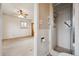 Bathroom features white tiled shower and access to the bedroom at 7264 S Platte Canyon Dr, Littleton, CO 80128