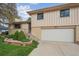 Charming two-story home with a brick and siding exterior, complemented by a well-manicured front yard at 7264 S Platte Canyon Dr, Littleton, CO 80128
