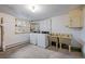 Basement featuring laundry machines, utility sinks, and a small window at 1317 Birch St, Denver, CO 80220