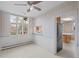 Dining room with a ceiling fan and a window overlooking the front yard at 1317 Birch St, Denver, CO 80220