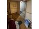 A basement room with carpet is presented, next to an open doorway leading to another room at 7863 S Harrison Cir, Centennial, CO 80122