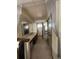 Bathroom featuring double sinks and mirrored closet at 7863 S Harrison Cir, Centennial, CO 80122