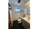 Contemporary bathroom featuring modern fixtures, sink, and mirror at 7863 S Harrison Cir, Centennial, CO 80122