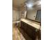 Bathroom showcasing a vanity with sink and ceramic tiled flooring at 7863 S Harrison Cir, Centennial, CO 80122