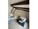 Vaulted living room features wooden ceiling beams, a chandelier, and large windows at 7863 S Harrison Cir, Centennial, CO 80122