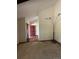 Bright open-concept living area with tree lamp and hardwood floors at 7863 S Harrison Cir, Centennial, CO 80122