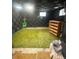 A sound room is displayed, featuring green carpet and acoustic panels on the walls at 7863 S Harrison Cir, Centennial, CO 80122