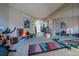 Versatile flex room featuring mirrors, recessed lighting, and neutral paint at 7176 S Pierson St, Littleton, CO 80127