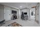 This basement living room features recessed lighting, a gaming setup and neutral decor to create a cozy space at 7176 S Pierson St, Littleton, CO 80127