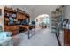Well-organized office with built-in bookshelves and desk, providing a functional workspace with ample storage at 7176 S Pierson St, Littleton, CO 80127