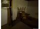 Corner of basement filled with discarded household items at 12058 E Virginia Pl, Aurora, CO 80012