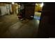 Unfinished basement room with low ceiling and concrete floor at 12058 E Virginia Pl, Aurora, CO 80012