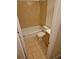 Compact bathroom featuring neutral tile, shower-tub combo, and vanity at 12058 E Virginia Pl, Aurora, CO 80012