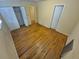 Spacious bedroom with hardwood floors and ample closet space at 12058 E Virginia Pl, Aurora, CO 80012