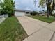 Charming single-Gathering home with a spacious driveway and attached garage at 12058 E Virginia Pl, Aurora, CO 80012