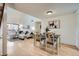 The dining room is adjacent to the living room, has wood floors and is perfect for gatherings at 324 Wright St # 304, Lakewood, CO 80228