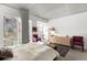 Main bedroom with large windows and a sitting area at 1620 Little Raven St # 109, Denver, CO 80202