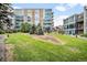 Community courtyard with grassy lawn and building view at 1620 Little Raven St # 109, Denver, CO 80202