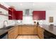 Stylish kitchen with custom cabinets, modern appliances, and hardwood flooring at 1620 Little Raven St # 109, Denver, CO 80202