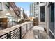 Private patio with outdoor seating and walkway at 1620 Little Raven St # 109, Denver, CO 80202