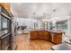 An open concept kitchen and living room area, filled with natural light and views at 21416 E Ottawa Cir, Aurora, CO 80016
