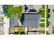 Aerial view showcasing the property's layout, including the house, garage, and well-maintained yards at 2571 S Cherokee St, Denver, CO 80223