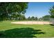 Scenic view of a well-maintained baseball field surrounded by lush green grass and mature trees at 2571 S Cherokee St, Denver, CO 80223
