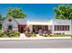 Charming storefront with pink accents, floral decor, and inviting curb appeal at 2571 S Cherokee St, Denver, CO 80223