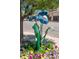 Street view featuring unique blue flower sculptures and landscaping at 2571 S Cherokee St, Denver, CO 80223