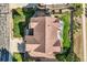 Birds eye view of a home with a beautiful roof and manicured lawn at 1805 Parkdale N Cir, Erie, CO 80516