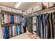 Walk-in closet with organized shelving, hanging rods, and ample storage space at 1805 Parkdale N Cir, Erie, CO 80516