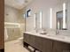 Bright bathroom with a glass shower, double vanity, and lots of space at 132 N Gold Flake Ter, Breckenridge, CO 80424
